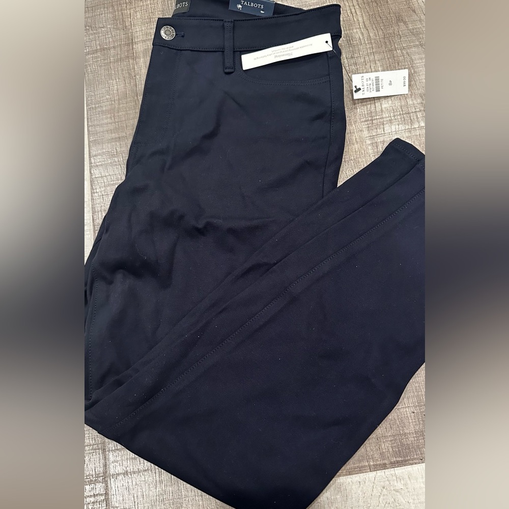 NWT , black high waisted, skinny leg, ankle length